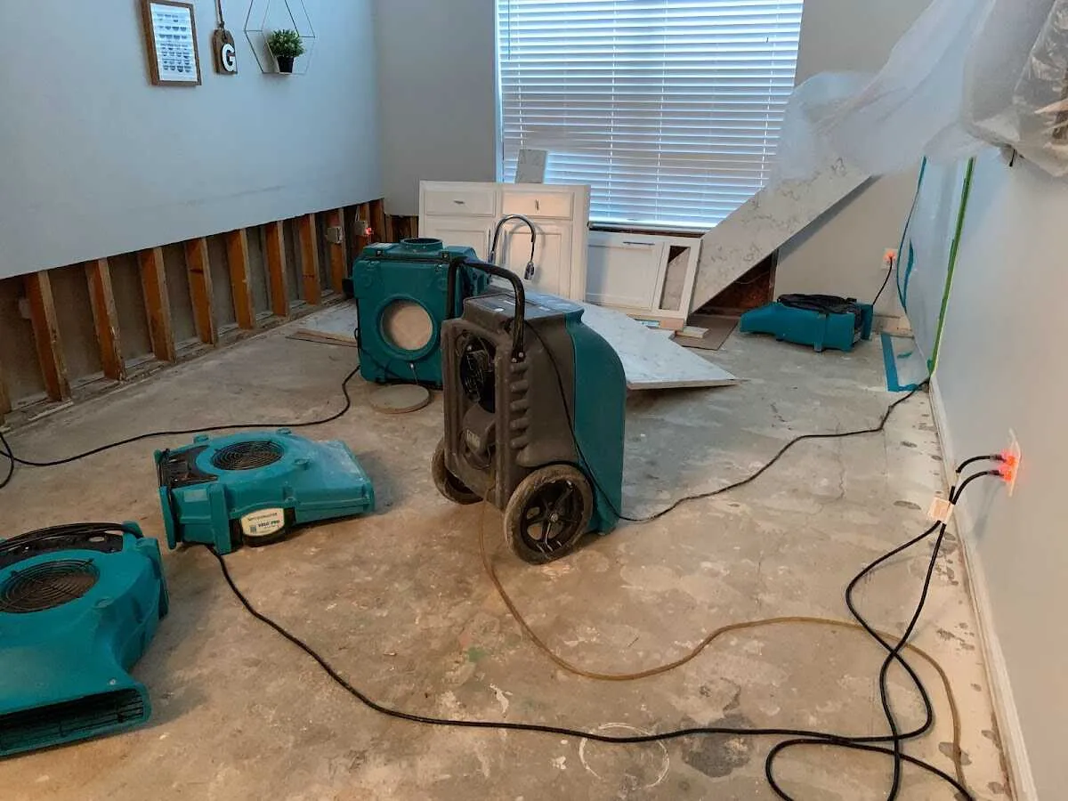 Dehumidifier in flood-cut room for Water Damage Restoration in Kearney